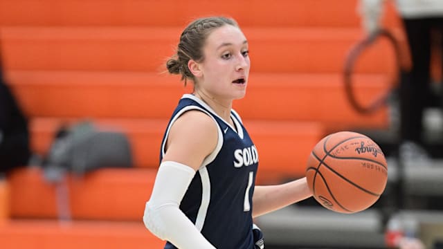 Mackenzie Blackford of Solon brings the ball up the floor